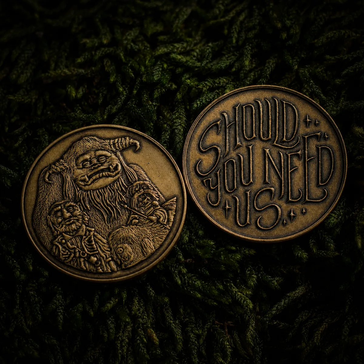 Labyrinth token — both sides of the brass coin, the goblin-king face and the reverse reading &ldquo;Should you need us&rdquo;